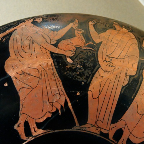 An erastes offers a hare as a gift to his eromenos.  Detail of an Attic red-figure kylix, signe