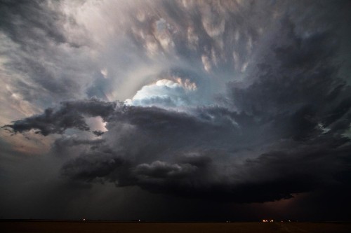 writinginslowmotion: awhisperinthenight: requiem-on-water: storm clouds above the American Midwest b