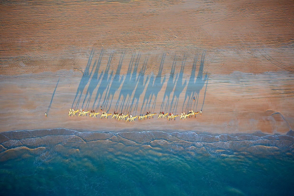 Shadow stories (Cable Beach camel safari, Broome, Western Australia)