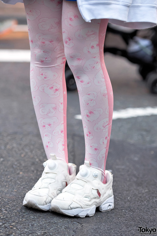 Gyoza-chan on the street in Harajuku wearing an oversized hoodie with Omochi Alien graphic tights, R