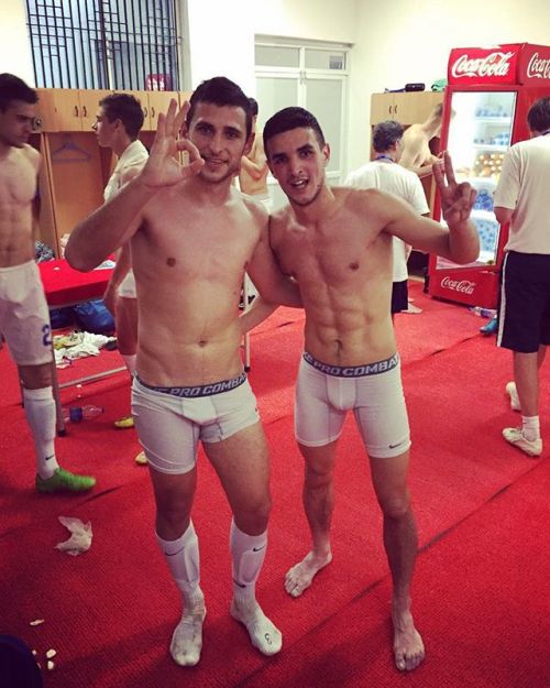 Jocks hanging out in the locker room in their underwear