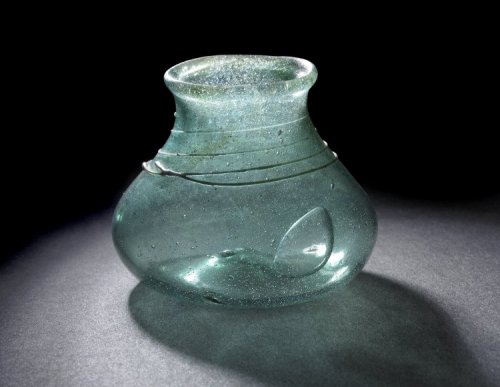 Globular glass beakerEarly Anglo-Saxon, 7th centuryHeight: 6.3 centimetresDiameter: 4.5 centimetres 