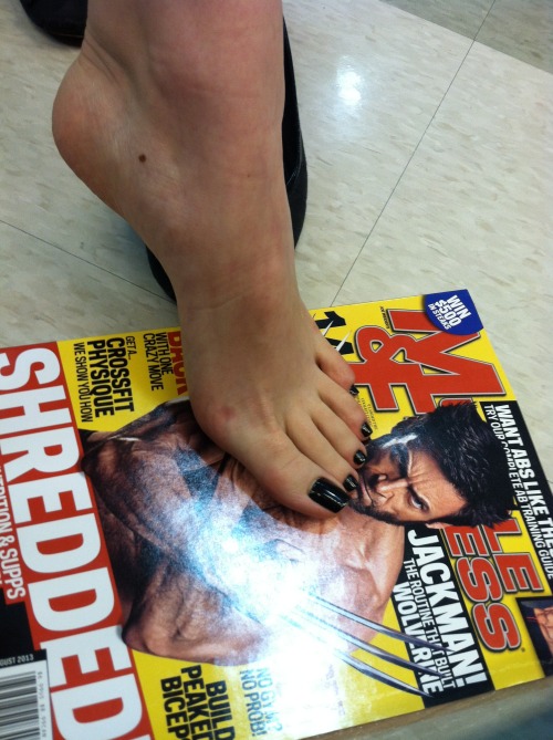 Perfection right here. My feet, sexy ass Wolverine (mr.jackman, please call me), and the article &ld