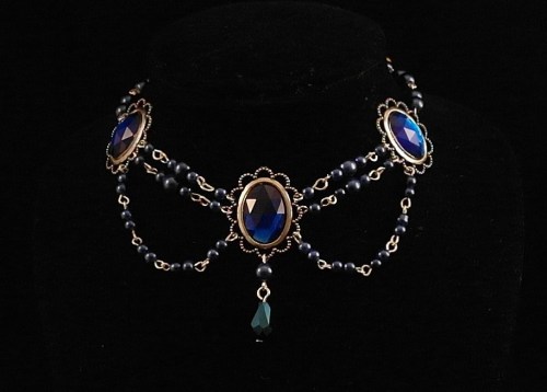 elvendesigns:  Gold tudor style necklace with amethyst stone settings also shown with bottle green stone settings and a ruby stone variation in and faceted blue glass in silver plate. 