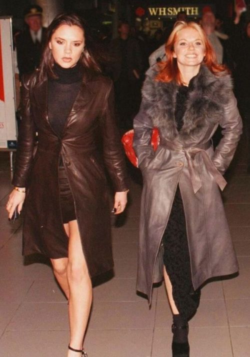 Geri Halliwell (Ginger Spice) and Victoria Beckham (Posh Spice)- Spice Girls