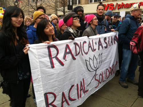 [Photo: a group of Asian Americans at Historic Thousands on Jones Street on Saturday, 2/8, holding a