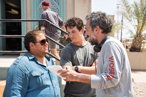 Todd Phillips gives direction to Jonah Hill and Miles Teller on the set of War Dogs.