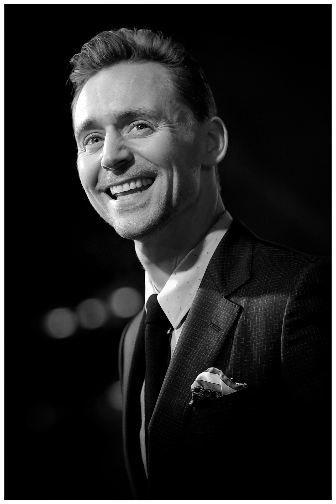 tom hiddleston laughing