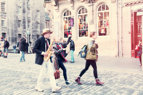 Dancing with the street musician.