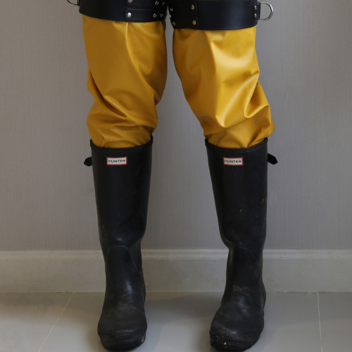 Restrcited to feel free - Hunter rubber boots and yellow Guy Cotten pouldo trousers.rainwearp