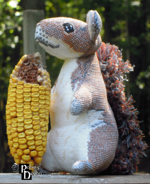 Meet Merlin the 3D cross stitched gray squirrel. His coat was cross stitched with blended colors to 