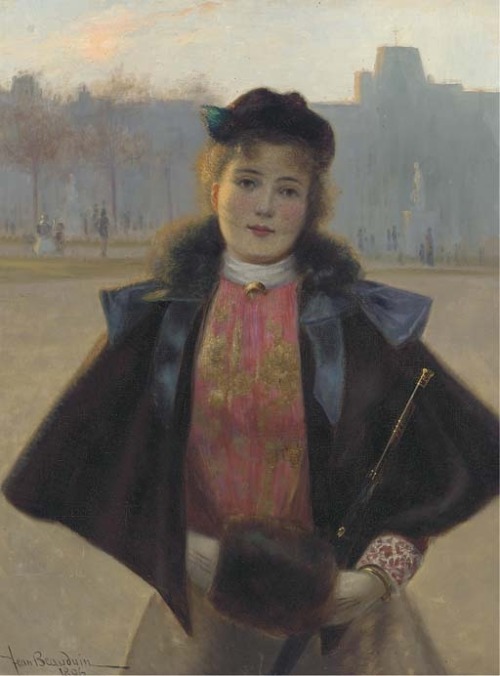 Jean Beauduin (1851 - 1916)Portrait of a young woman, three quarter length, in a winter park with fu