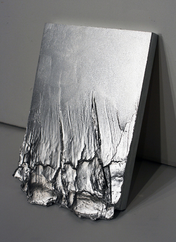 ss6x:  Rebecca Ward - pancake breakfast, sheetrock mud and spray paint on panel,
