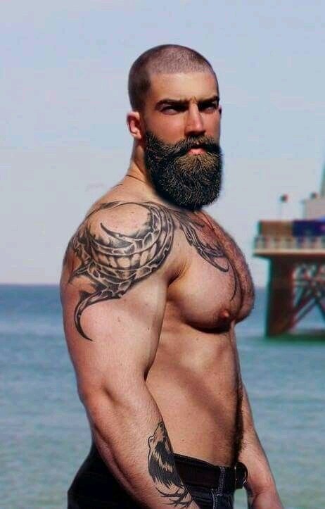 fitbearcatcher:bzzzguy:manlymuscle:Bearded, inked, ocean-GOD with incredible pecs & nips#nicebea