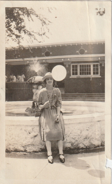 “Bunch of Balloons” - a group of young ladies posing at a park with rubber balloons on s