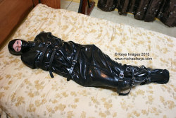 michaelkeye:  Michael Keye - Keye Bondage Images: http://michaelkeye.tumblr.com/2/10/15 - Stacie Snow stars in Sacked and Gagged 3.Stacie was an overnight guest.  She asked for an extra blanket but instead we gave her a rubber bondage bag.  She is a