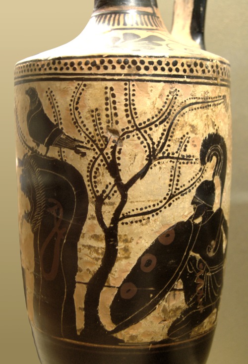 Achilles lies in wait for Polyxena at a fountain.  Attic white-ground lekythos, attributed to the At