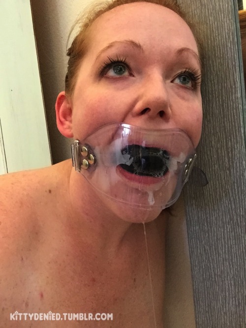 kittydenied:Enjoying my clear panel gag until I’m needed again. Nice and humiliating… 