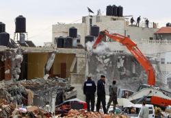 israelfacts:  A Palestinian family cry after their home was demolished by Israeli forces in the East Jerusalem neighbourhood of Beit Hanina on February 5, 2013. Although East Jerusalem belongs to Palestinians, they have to obtain building permits from