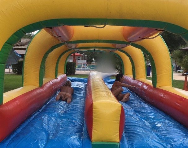 covenudist:  Having fun on the giant waterslide at Cypress Cove Resort! 
