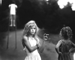 hauntedbystorytelling:    Sally Mann :: Candy Cigarette, 1989  more [+] by S. Mann