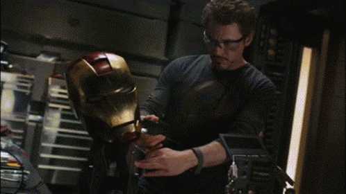 Iron Man solders his helmet