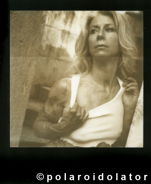 polaroidolator:   				Tower Guard I.  June 2012.Model: Burning LotusCamera: SLR