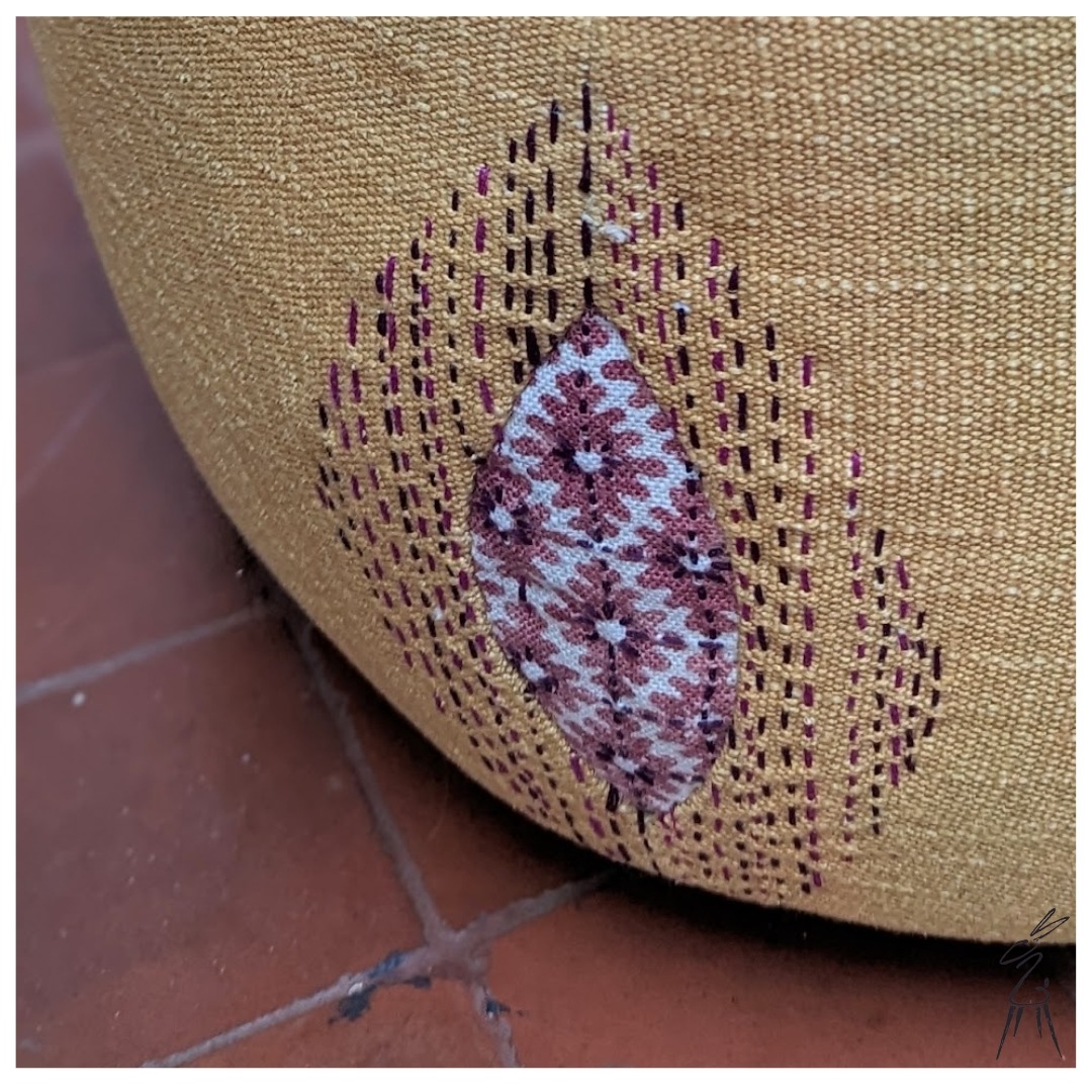 The Hare in the Chair - How to use visible mending to repair pet damaged
