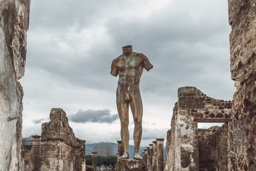 Bronze sculpture by Igor Mitoraj at the ruins of Pompeii, ItalyPompeii |  Ancient ruins | 