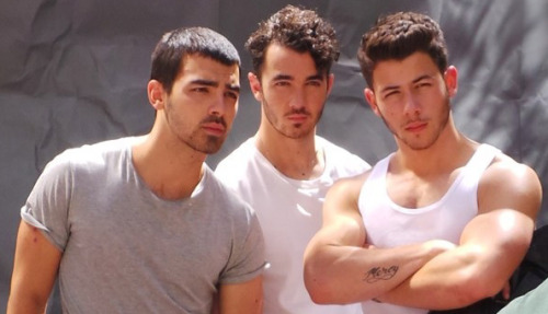 The Jonas Biceps: The Jonas Brothers strike a pose for Out magazine: From left, Joe, Kevin, Nick and Nick’s arms. (Via Instagram.)