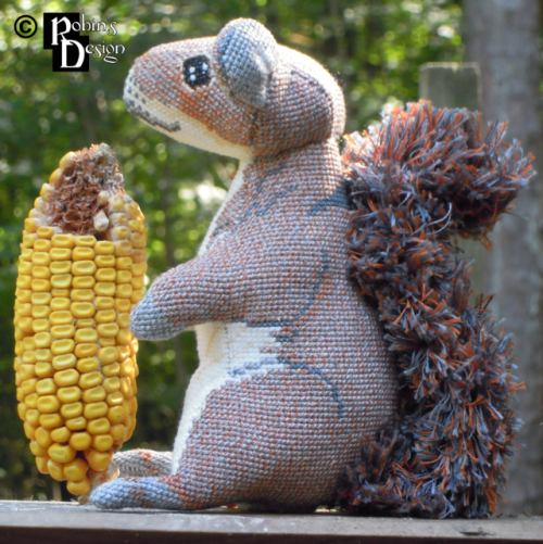 Meet Merlin the 3D cross stitched gray squirrel. His coat was cross stitched with blended colors to 