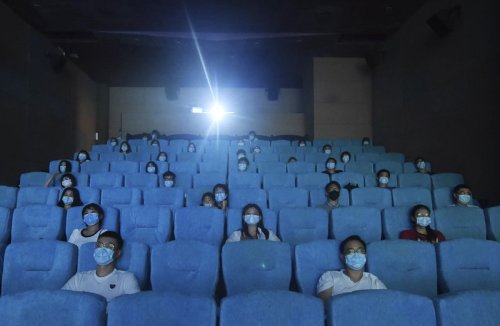 newloverofbeauty: Movie-goers, China, July