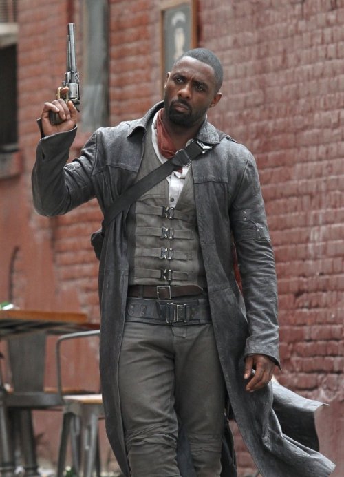 superheroesincolor:   Idris Elba as Roland Deschain // The Dark Tower (2017)  The Dark Tower series tells the story of Roland Deschain, Mid-World’s last gunslinger, who is traveling southeast across Mid-World’s post-apocalyptic landscape, searching