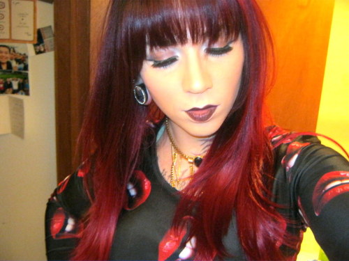 thegirlbornboy:  Loving this new color in my hair. What do you guys think? I’m so prone to sticking with black, but i might keep the faded red tones :)  