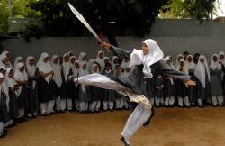 rosebleue:  mvslim:    These Indian Muslim schoolgirls, all aged between 10 and 16 years old, are performing Vovinam, a Vietnamese martial art, at the Saint Maaz High School in Hyderabad. Encouraged by their parents and school officials, they are learning