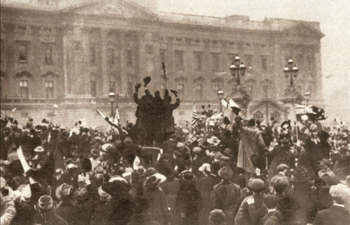 Crowds of people celebrating the signing of the Armistice and end of the Great War at November 11th 