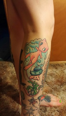 fuckyeahtattoos:  A combination of some of my favorites - Mew, a Maiamai, and Tree Spirits! Done by Brian Mcfadden at Three Anchors Tattoo in Cuyahoga Falls, Ohio.