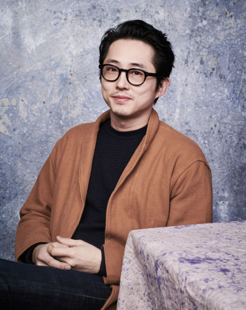 celebsofcolor: Steven Yeun poses for a portrait at Deadline Hollywood Studio during the Sundance Film Festival on January 20, 2018 in Park City, Utah.