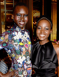 :  Alek Wek and Lupita Nyong’o attend the