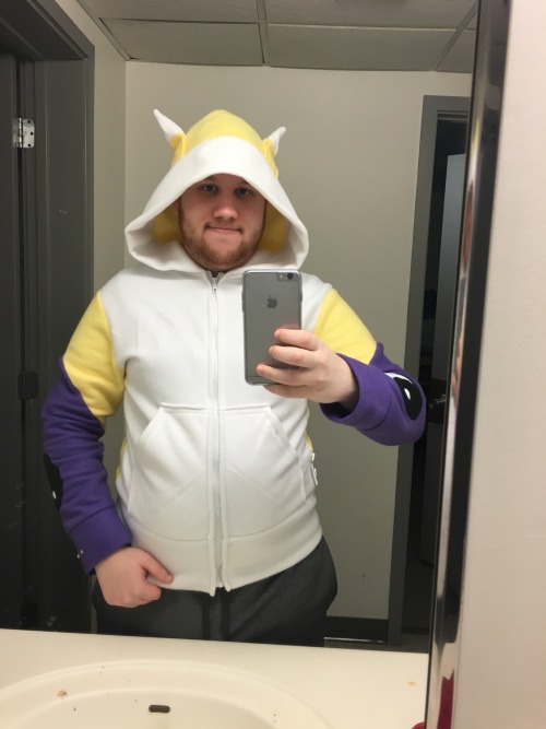 fuzzyredcub:  Something I’d honestly never do but I thought it was hilarious. One of my roommates had a Renamon hoodie. I decided to wear it and take pictures. It’s tight on me (he’s really skinny) but I think I look cute in it. I loved Digimon