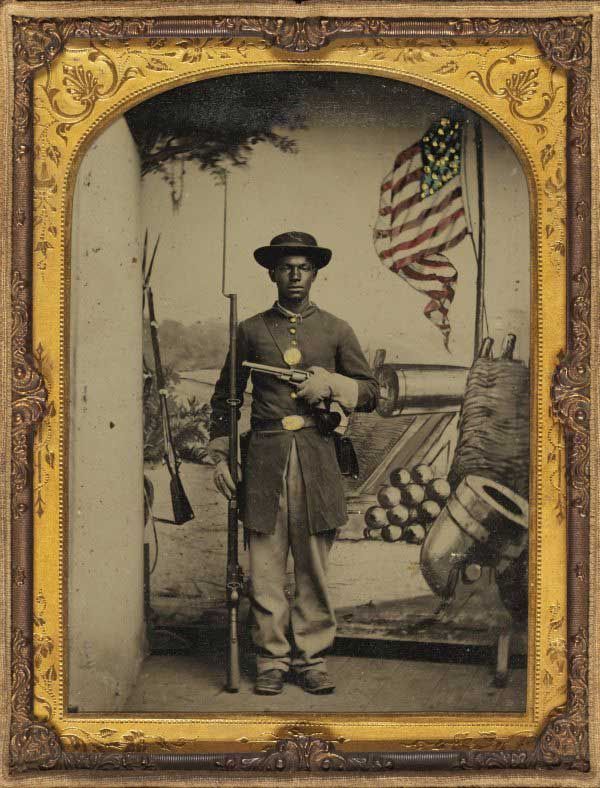 blackhistoryalbum:  African American soldier in Union uniform with a rifle and revolver