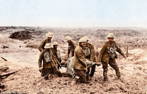 &ldquo;Bloodbath and mudbath Seven stretcher bearers struggle to carry a wounded man to safety in Fl