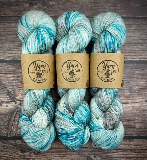 Tipsy Shark is a beautiful, speckly blend of Teals, Grays, and taupe. This is the type of colorway t