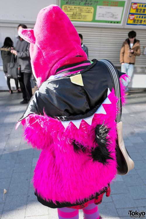 Mekiru on the street in Harajuku w/ pink Superlovers monster hoodie, striped tights, furry leg warme