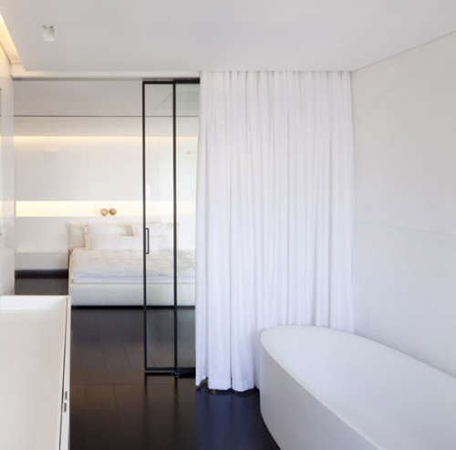 {Glass Act. Love the dark-mullions on these glass dividers - whether they’re windows or doors 