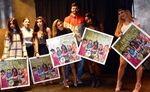 5hontour:Fifth Harmony holding their Gold Certificate Plaques for Worth It in Germany (via @sonymusi