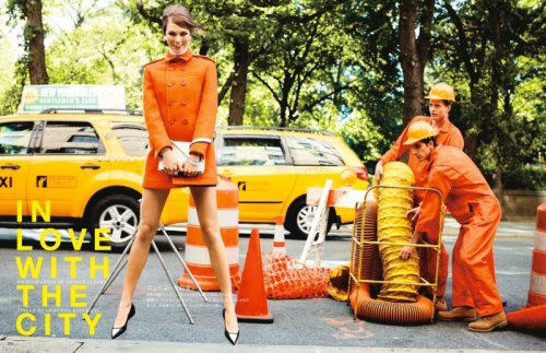 Taking a break from her supervising duties, this New York City road worker pondered whether her unif