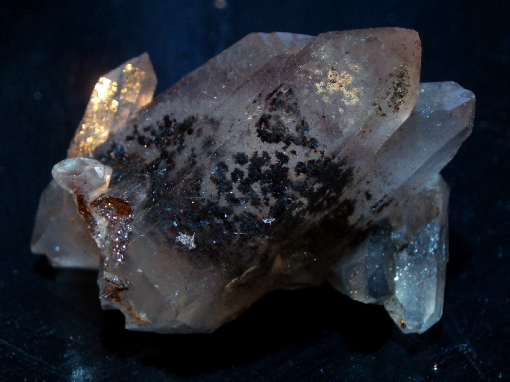 themineralogist:  Quartz with Hematite inclusions by A. Tuma 