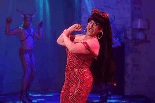 GIFset Of DeLa In The Tartan Pantsuit That Nobody Asked For