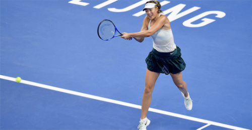 Maria Sharapova defeats Anastasija Sevastova 7-6, 5-7, 7-6 in the first round of the China Open.